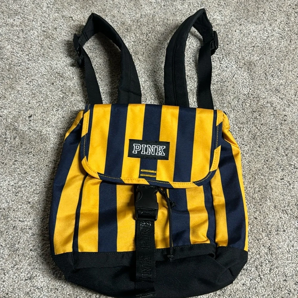 Like New PINK mini backpack navy/yellow stripe drawstring and buckle closure